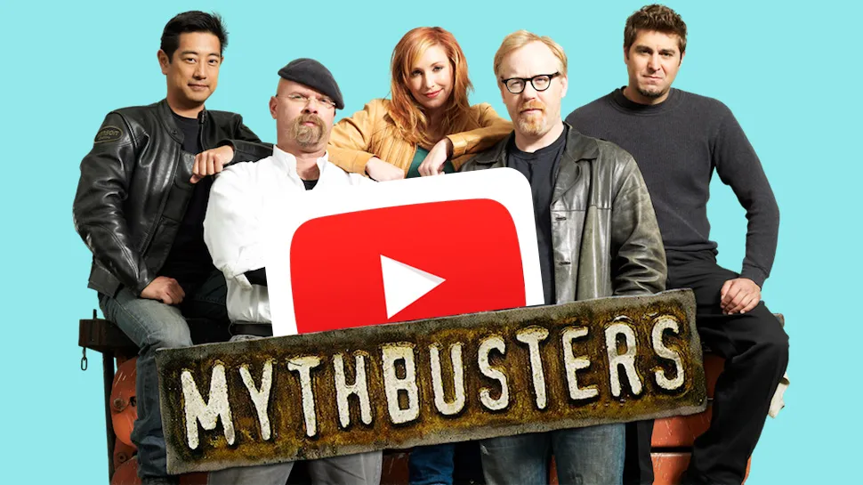 The MythBusters cast posing with a large YouTube play button